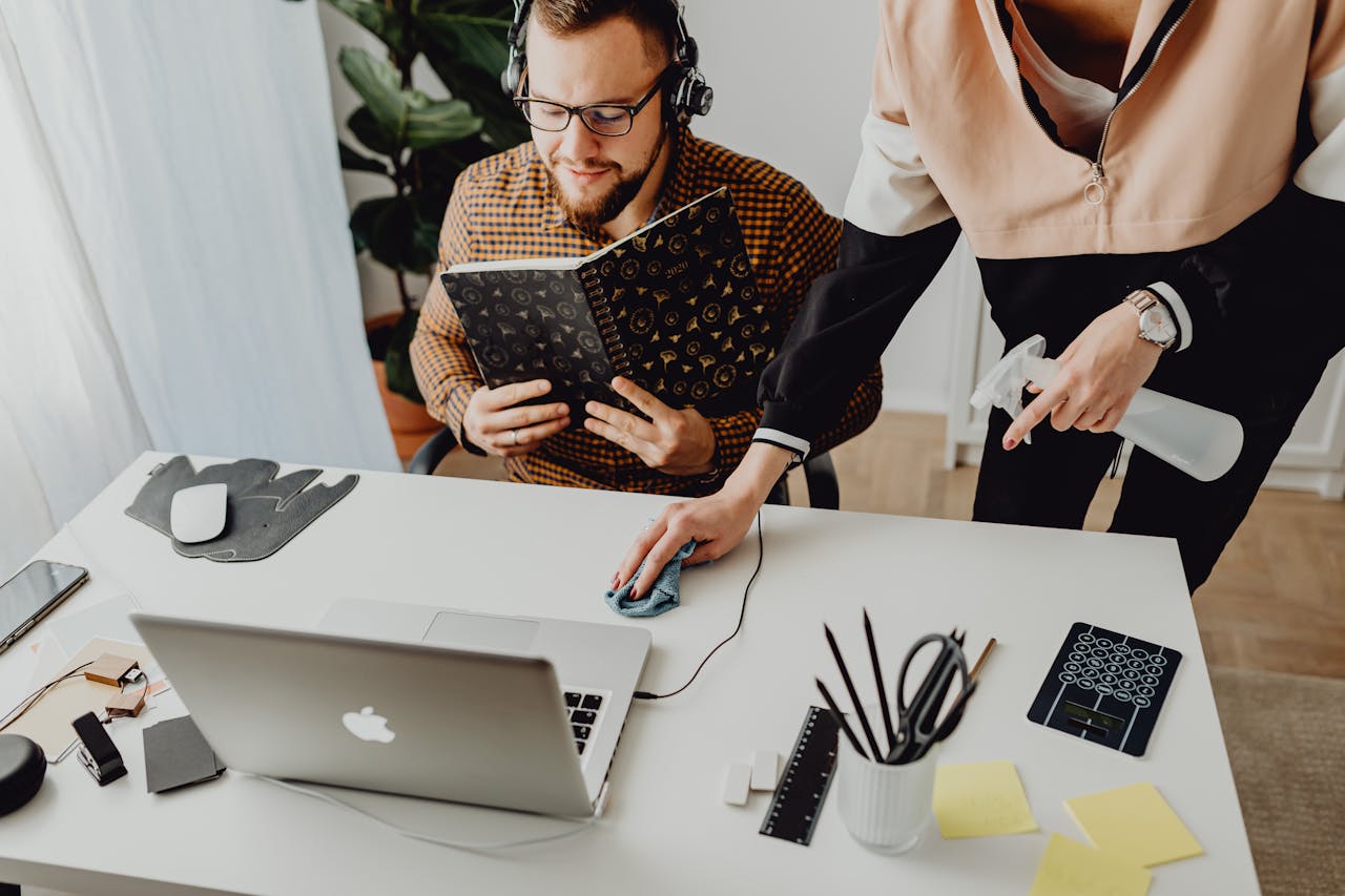 why-choose-us Colleagues interact in a modern office setting, blending technology with workplace hygiene.